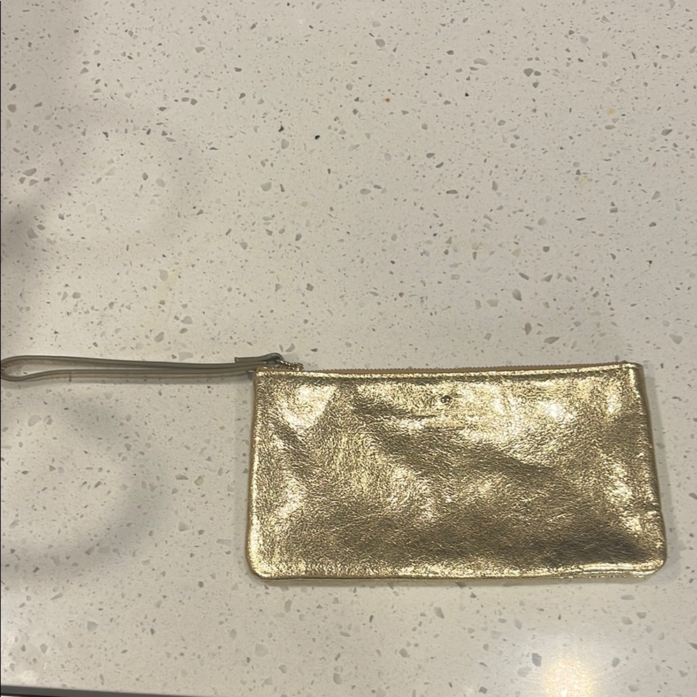 Like new Kate Spade Gold wristlet
